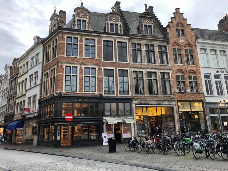 Explore the town squares and admire the beautiful architecture, Bruges.