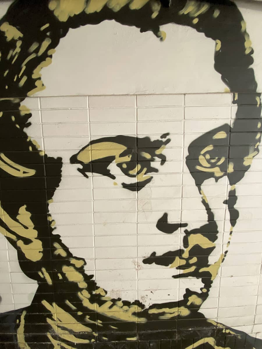 Kutná Hora street art, featuring medieval kings, coins and famous composers.