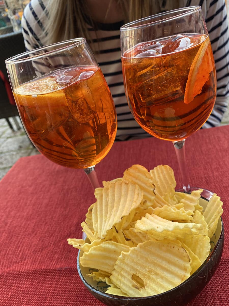Amazing places to eat and where in Venice. Drink an Aperol Spritz.