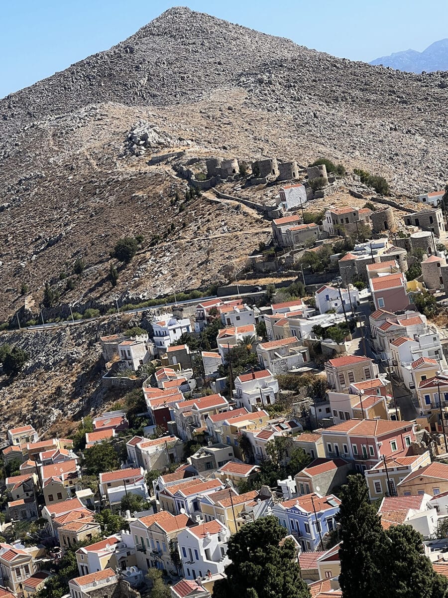 Views out over the bay of Symi and windmills.
